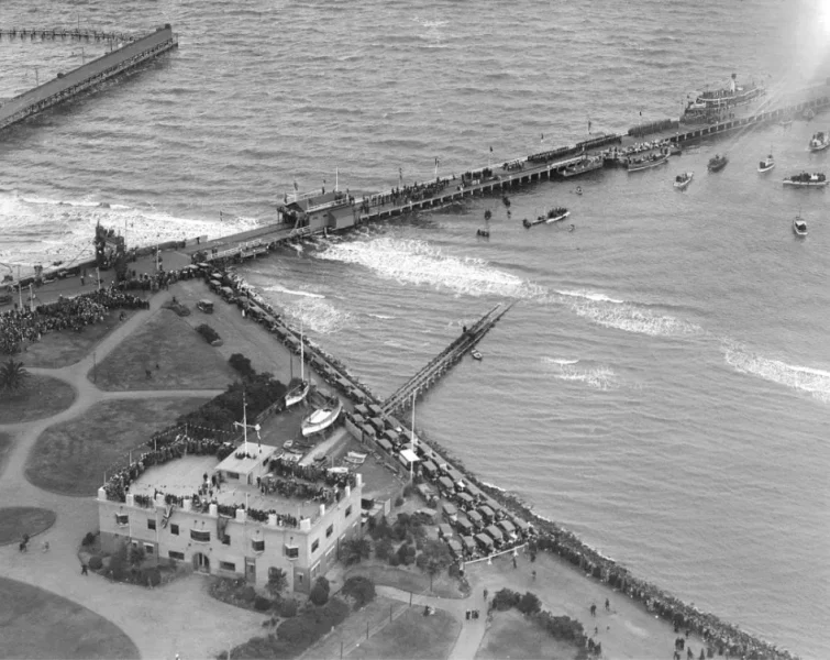 People gathered on top of the RMYS building to watch the boat race