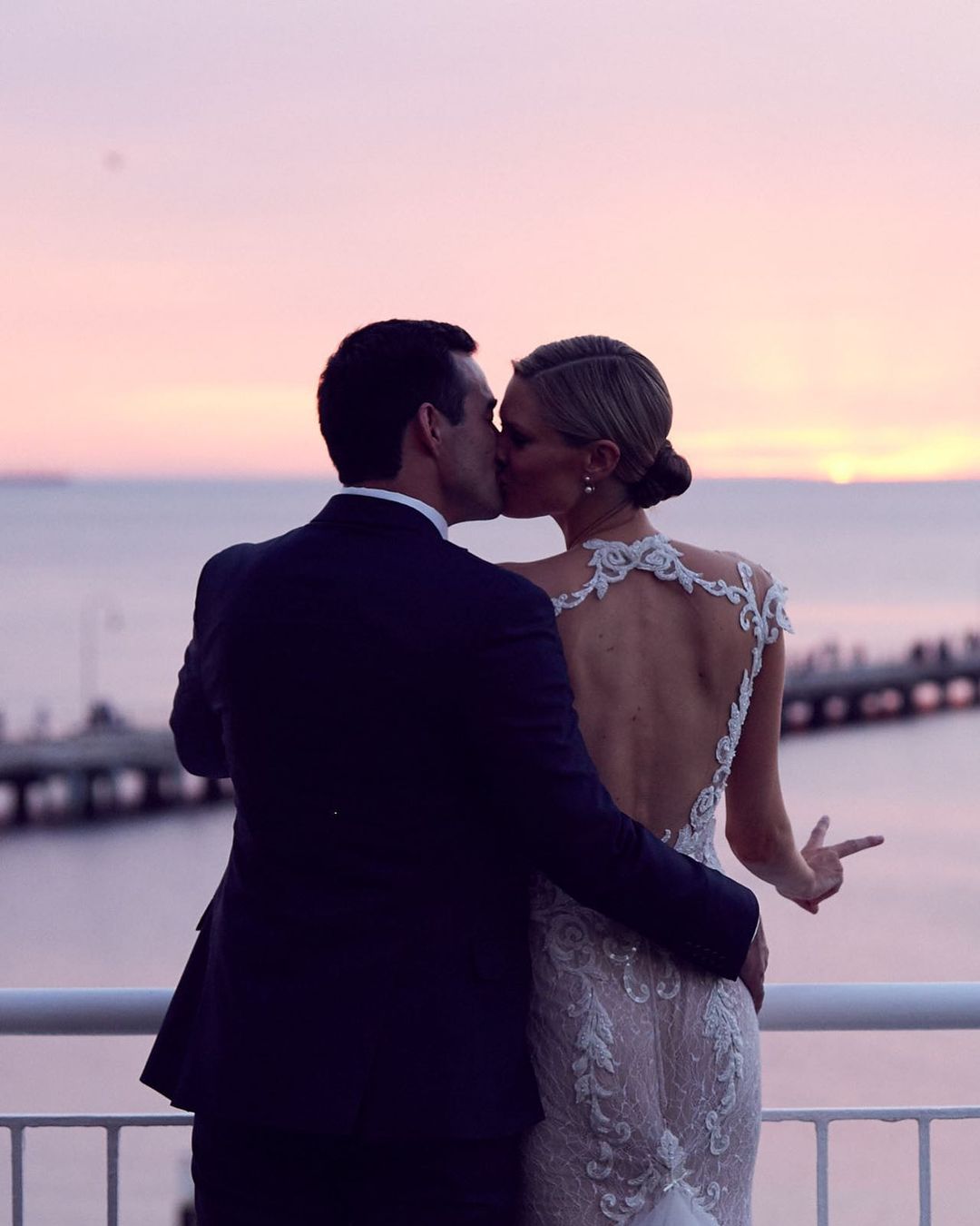 Bride and groom on rooftop terrace