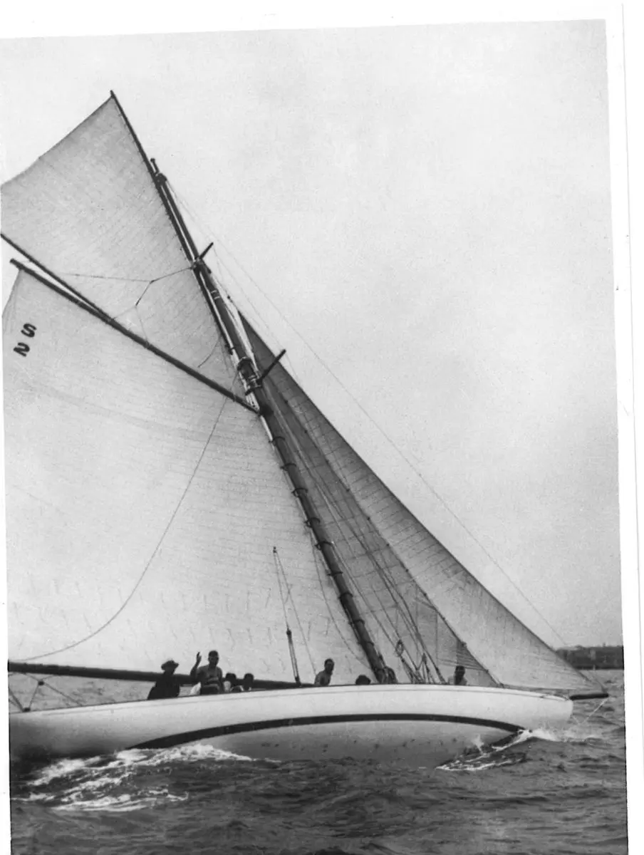 A sailing yacht going through the water at St Kilda beach