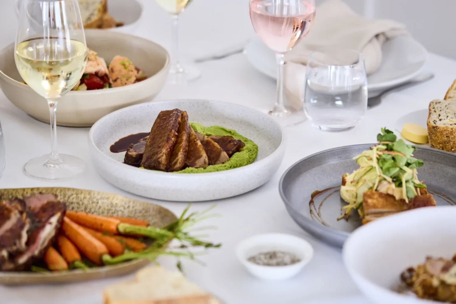 A table set with delicious food and wine